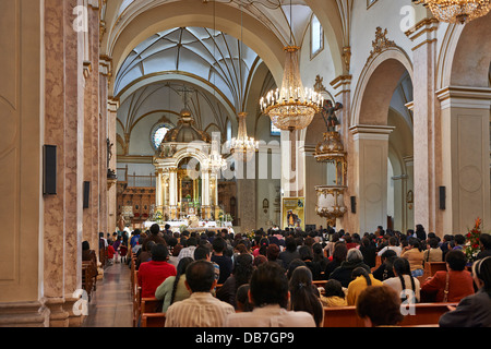 Interior shot, mass in Catedral Metropolitana, cathedral of Sucre, Bolivia, South America Stock Photo