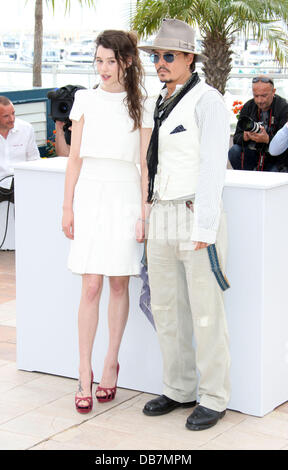 Astrid Berges-Frisbey and Johnny Depp 2011 Cannes International Film Festival - Day 4 - Pirates of the Caribbean: On Stranger Tides - Photocall Cannes, France - 14.05.11 Stock Photo