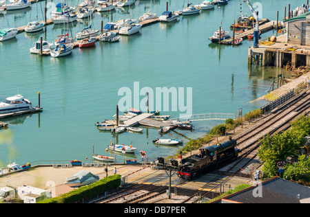 Kingswear, Devon, England. July 9th 2013. The River Dart and Dart Valley Railway with the steam railway engine. Stock Photo