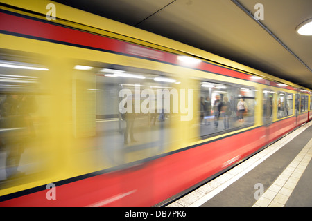 Train arriving, motion effect, new station of Brandenburger Tor on the U-bahn subway line 55, BVG, Berliner Verkehrsbetriebe of Stock Photo