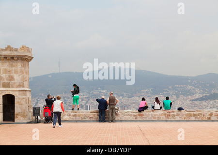 Tourists on Montjuic Castle overlooking Barcelona Stock Photo