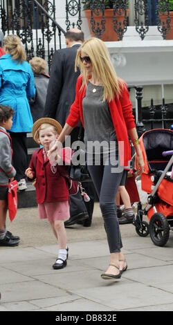 German model Claudia Schiffer takes her daughter Clementine to school ...