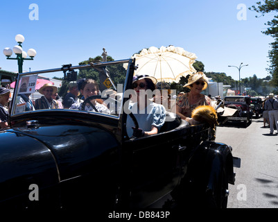 dh Art Deco weekend NAPIER NEW ZEALAND People 1930s classic vintage car parade woman dress fashion driving cars Stock Photo