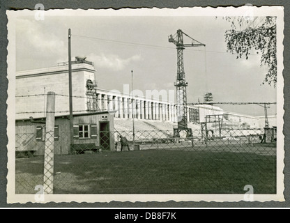 geography / travel, Germany, Nuremberg, building site of the Nazi party rally grounds, construction of the Zeppelin stand, stand with columns gallery, built 1935-1937 by Albert Speer, guardhouse with sleeping guard, building site few month before the completion of the propaganda buildings, swastikas become mounted, 1937, Additional-Rights-Clearences-Not Available Stock Photo