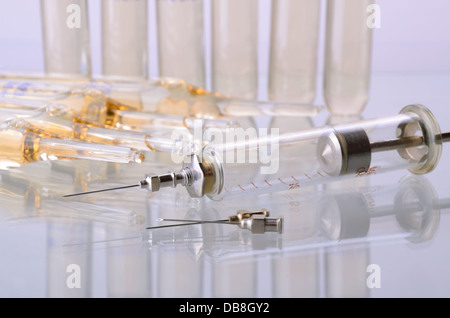 Set of medical empty needles, big and insulin needles on the white