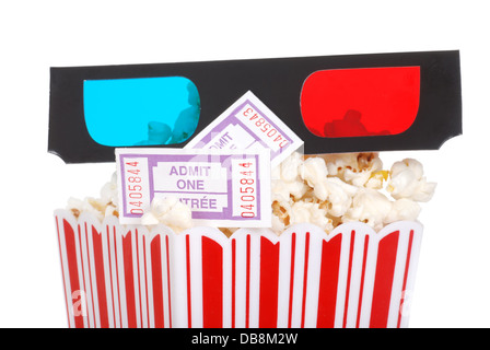 closeup movie tickets popcorn and 3D glasses Stock Photo