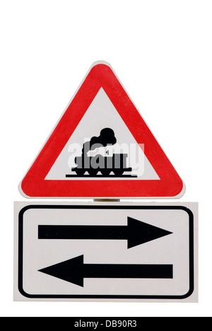 Road sign. Warning, railway crossing on the way Stock Photo