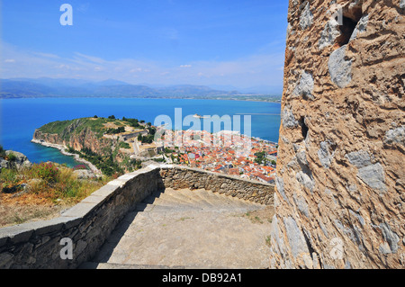 High aspect view and panorama of the old part of the seaport city of Nafplio and of Bourtzi Castle from Palamidi Fortress or Castle Peloponnese,Greece Stock Photo