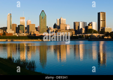 Montreal skyline at sunrise as seen from the Lachine Canal Stock Photo