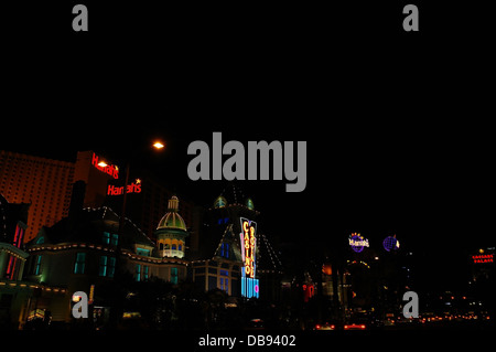 Oblique night view, looking south, traffic, electric lights green windows Casino Royale, Harrah's Hotel Casino, Las Vegas Strip Stock Photo