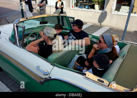 Female Driver Drives Car With Passenger And Smiles Stock Photo Alamy
