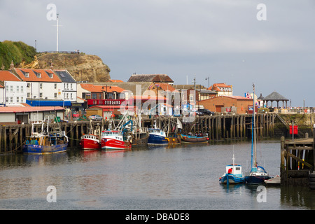 Fishing boats and trawlers in Whitby Harbour, North Yorkshire Stock Photo