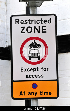 Street sign: Restricted Zone - no motor vehicles at any time, except for access (Rye, East Sussex, England, UK) Stock Photo