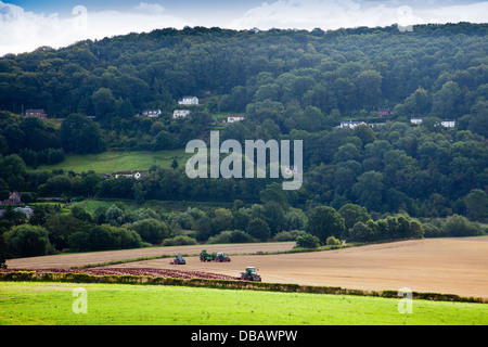 Ploughing a field below Leys Hill, Herefordshire, England, UK Stock Photo