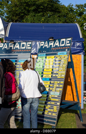 People searching the program of theater festival the Parade Stock Photo