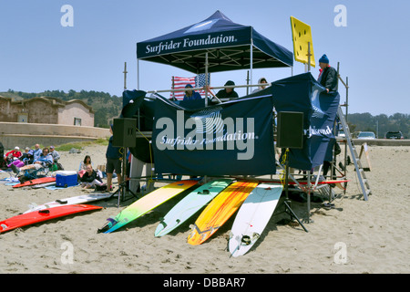 The judges stand at a surfing competition on a California Beach Stock Photo
