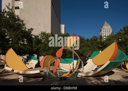 DROPPED BOWL WITH SCATTERED ORANGE SLICES AND PEELS FOUNTAIN METRO DADE PARK MIAMI FLORIDA USA Stock Photo