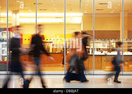Intentional Blurred Image of People in Shopping Center Stock Photo