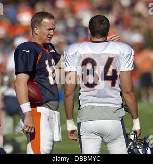 Englewood, Colorado, USA. 27th July, 2013. Denver Broncos QB PEYTON MANNING, left, talks TE JACOB TAMME, right, before the start of drills during Training Camp at Dove Valley Saturday Morning. Credit:  Hector Acevedo/ZUMAPRESS.com/Alamy Live News Stock Photo