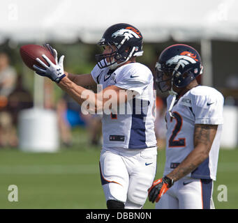 Englewood, Colorado, USA. 27th July, 2013. Denver Broncos TE JOEL DREESEN, left, catches as pass as he goes through drills during Training Camp at Dove Valley Saturday Morning. Credit:  Hector Acevedo/ZUMAPRESS.com/Alamy Live News Stock Photo