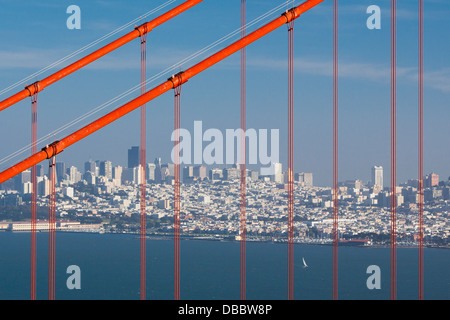 A view at midday thru the Golden Gate Bridge towards downtown San Francisco. IN California, USA. Stock Photo