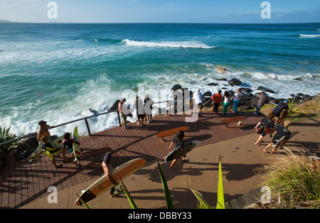 Spectators watching surfers at Greenmount Beach. Coolangatta, Gold Coast, Queensland, Australia