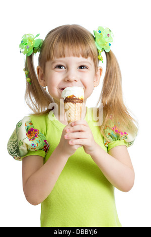 happy child girl eating ice cream in studio isolated Stock Photo