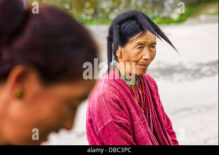 Woman from the Monpa tribe wearing hat made from yak hair in Tawang, western Arunachal Pradesh, India. Stock Photo