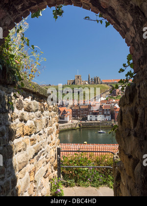 View to St. Marys through arch on West Cliff Whitby Yorkshire UK. Stock Photo