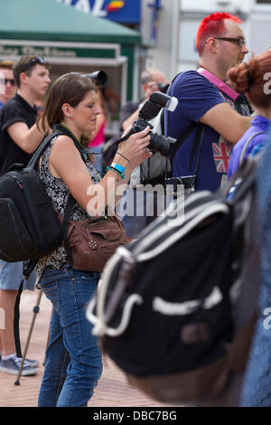 Northampton, UK. 28th July, 2013. Northampton's 7th Music Festival underway. 5 stages are set up around the town to showcase local musicians,  they started playing at midday and goes on goes on until 2200 hrs. This is the Market Square were the main stage is with crowds enjoying the music and good weather. Credit:  Keith J Smith./Alamy Live News Stock Photo