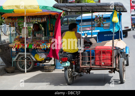 Tricycle in Tagbilaran on Bohol Island, Philippines Stock Photo