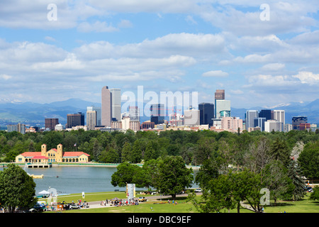 Downtown Denver city skyline from City Park with the Rocky Mountains in the distance, Colorado, USA Stock Photo