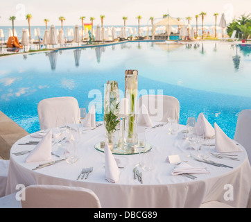 Decorated table for a wedding reception at beach resort Stock Photo