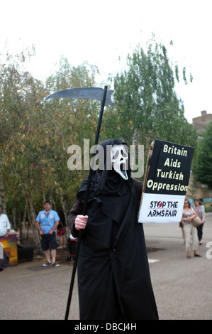 Scream-masked protester during a demo Stock Photo