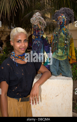Sara Maurin Kane Standing Next to Mami Watas, Artistic Creations of Sylvette Maurin. Goree Island, Dakar, Senegal. Stock Photo