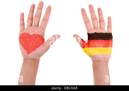 Hands with a painted heart and german flag, i love germany concept, isolated on white background Stock Photo