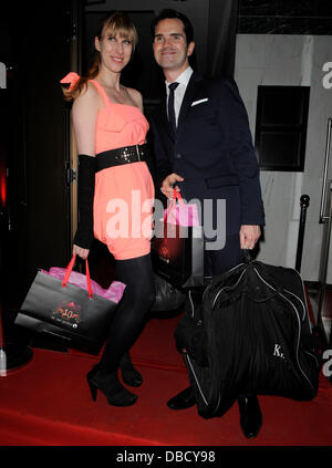 Jimmy Carr and his girlfriend leaving the 30th Anniversary of The Roof Top Gardens Kensington. At the end he thanked everyone for the attention and stated its not like we are going to see it in the papers but thanks. London, England - 06.06.2011 Stock Photo
