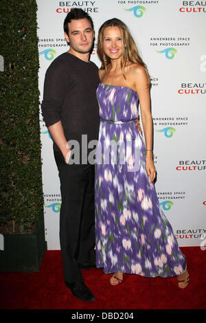 Petra Nemcova with her boyfriend Simon Atlee 'Beauty Culture' Photographic Exploration held at the Annenberg Space for Photography Century City, California - 19.05.11 Stock Photo