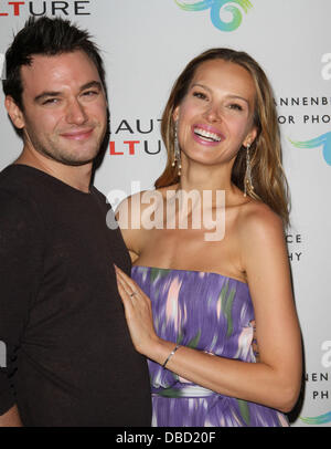 Petra Nemcova with her boyfriend Simon Atlee 'Beauty Culture' Photographic Exploration held at the Annenberg Space for Photography Century City, California - 19.05.11 Stock Photo