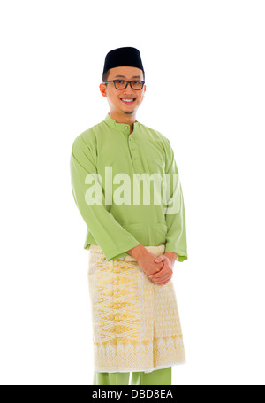 Malay male during ramadan festival with isolated white background Stock Photo