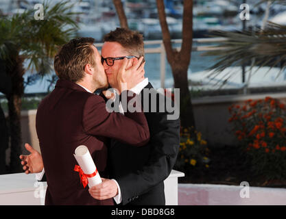 Actor Ryan Gosling (L) and 2011 Best Director Nicolas Winding Refn of the film 'Drive' pose   2011 Cannes International Film Festival - The Palm d'Or and Awards - Photocall Cannes, France - 22.05.11 Stock Photo