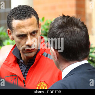 Rio Ferdinand The Manchester United team and management leave their London hotel after being beaten by FC Barcelona in the Champions League Final (28May11) London, England - 29.05.11 Stock Photo