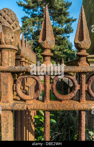 Old Victorian rusty railings in a grave yard. Stock Photo