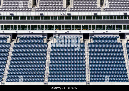 Rows of empty seats in a stadium. Stock Photo