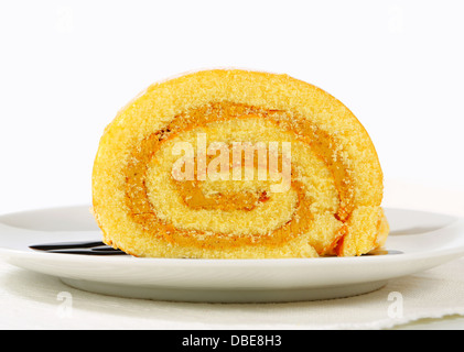 Swiss roll with peanut butter cream Stock Photo
