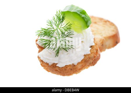 Baby cucumber and goat cheese; garnished with fresh dill. Stock Photo
