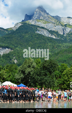 Europe, France, French Alps, Haute-Savoie, Passy, Passy Triathlon, swimmers at start line Stock Photo