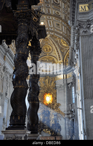 St Peter's Basilica interior with Saint Peter's altar and baldachin. Stock Photo