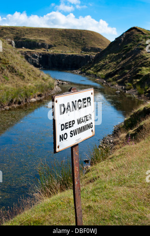 'Danger deep water no swimming' sign on the Titterstone Clee, Shropshire, England Stock Photo