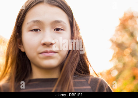 Japanese girl standing outdoors
